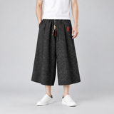 Nagi broek in zwart, wijde cropped broek met linnen-look en trekkoord